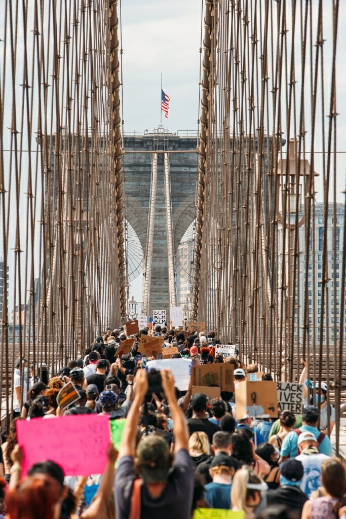 Protestors walk across the Brooklyn Bridge in support of Black Lives Matter